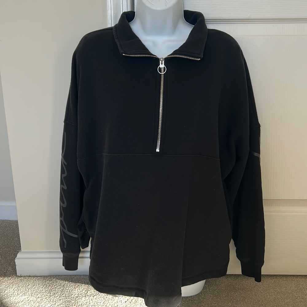 Pink black pullover.